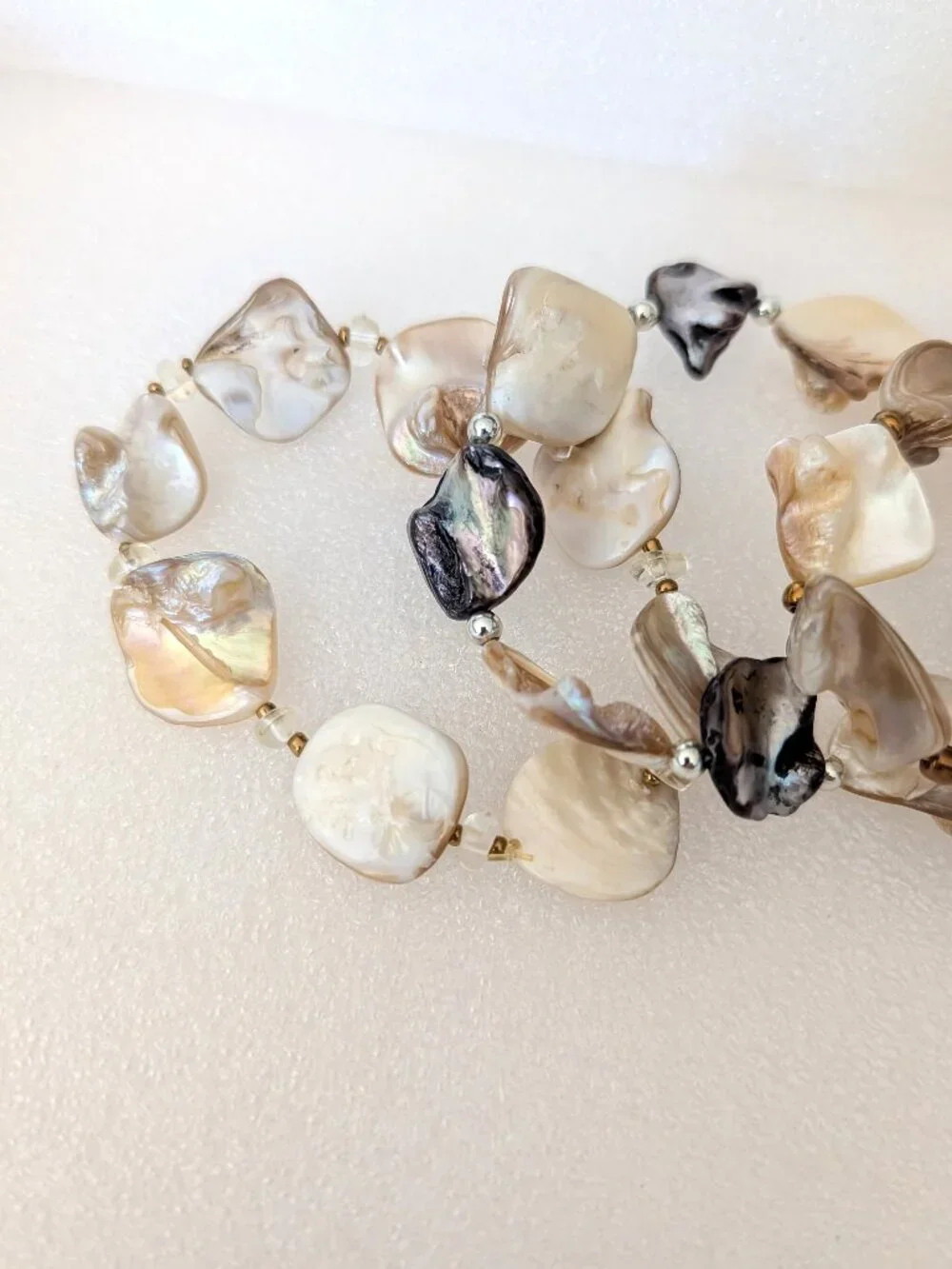 Set of 4 polished shell stretch bracelets-neutral tones
